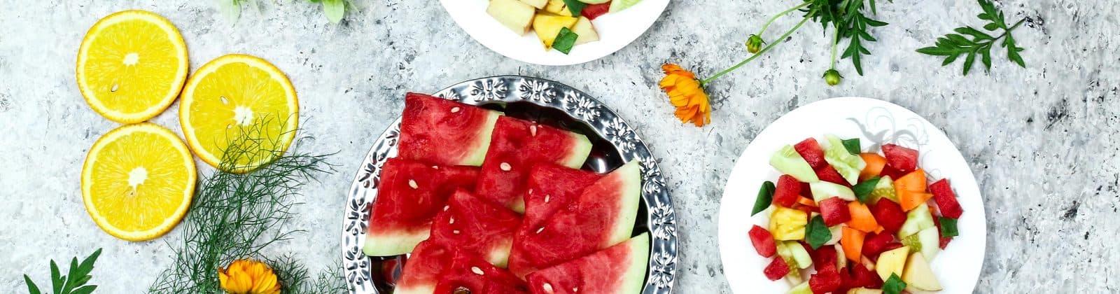 Fresh fruit, citrus and herbs laid out — flavour development for OEM instant powder manufacturing at D&O Nutraceutical, Malaysia