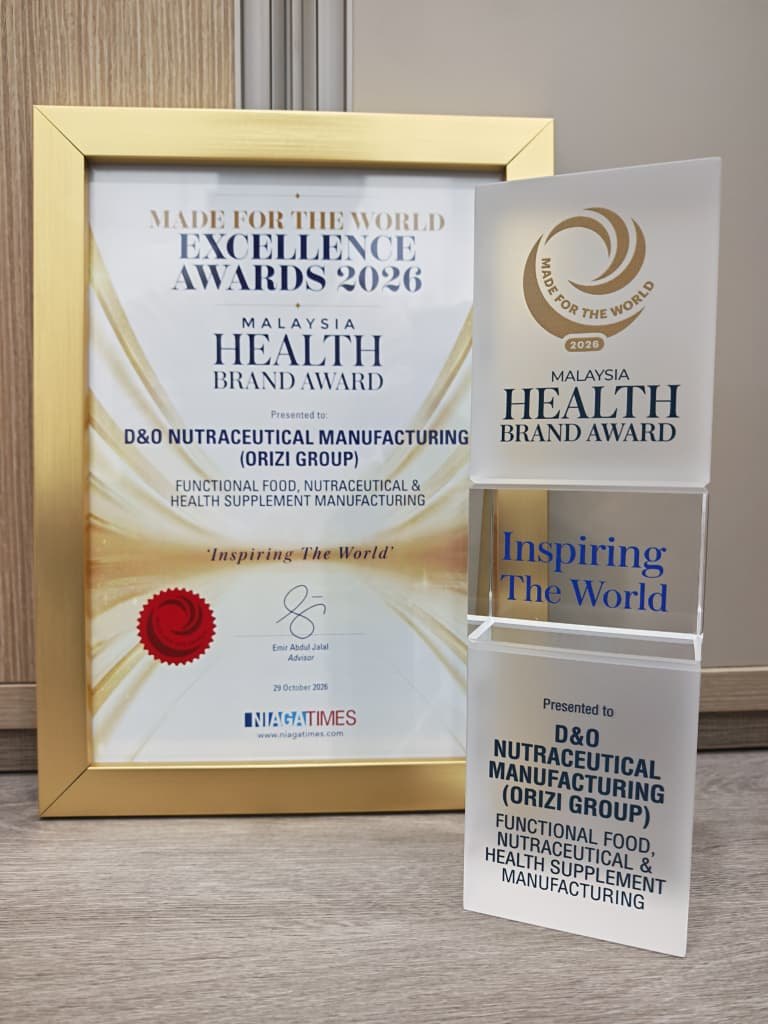 The Malaysia Health Brand Award certificate and trophy presented to D&O Nutraceutical Manufacturing (ORIZI Group)